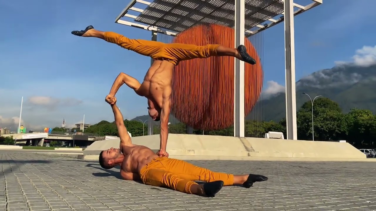 J. And L. Omana (Hand to hand duo) 2024. Music by The Weeknd “I Feel It Coming”