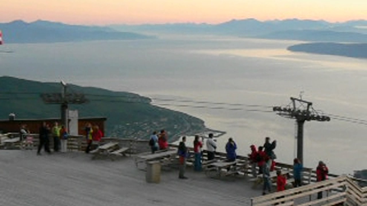Midnight sun above Ofotfjorden in Narvik (Norway)