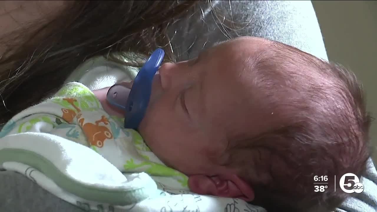 Hallway Heroes: Green fire medics help mom deliver baby boy in apartment hallway