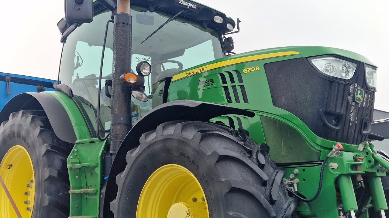 John Deere 6210R załadunek na lawetę. 