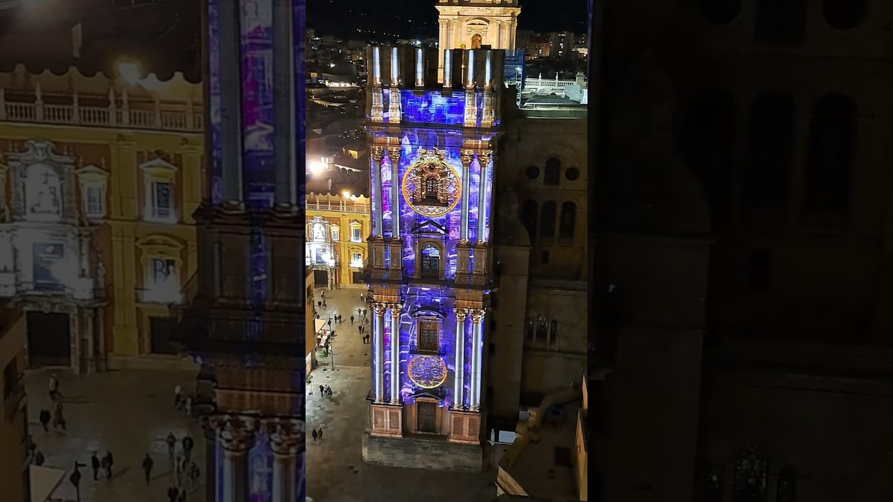 Spectacular light show projected on to a tower of Malaga Cathedral. December 2025.