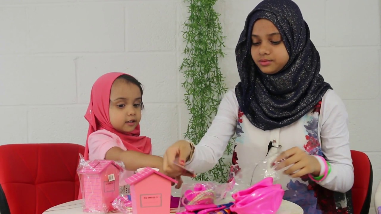 Maryam and Fatima are opening toyset from Zaky