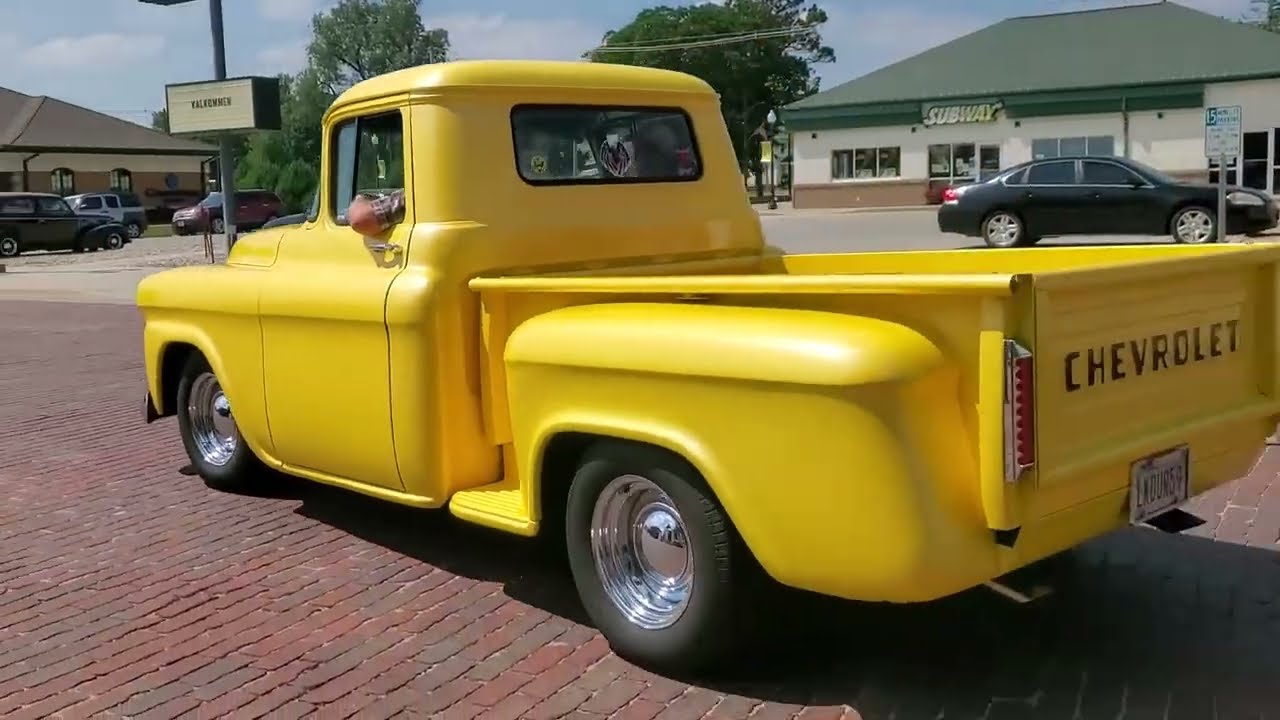 Cars leaving the 2024 Swedish Midsommar Festival Car Show in Stromsburg, Nebraska