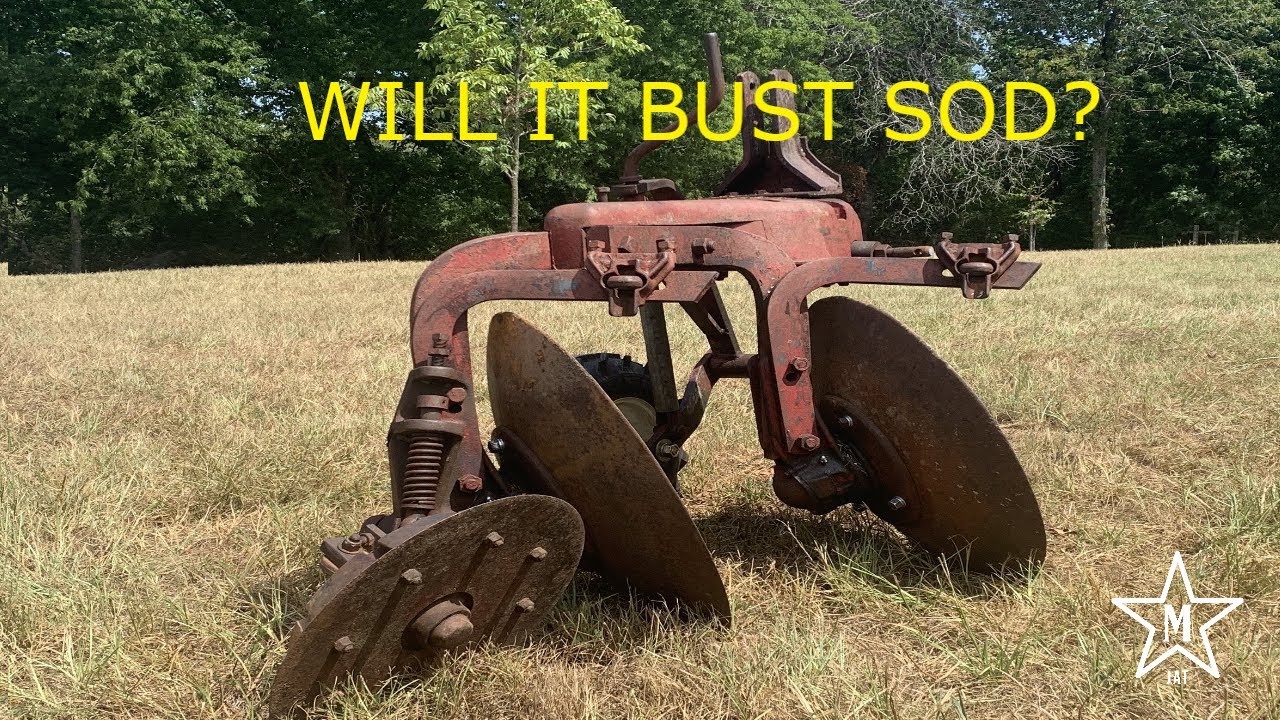 Grandpas old Rusty TWO DISC TURNING PLOW
