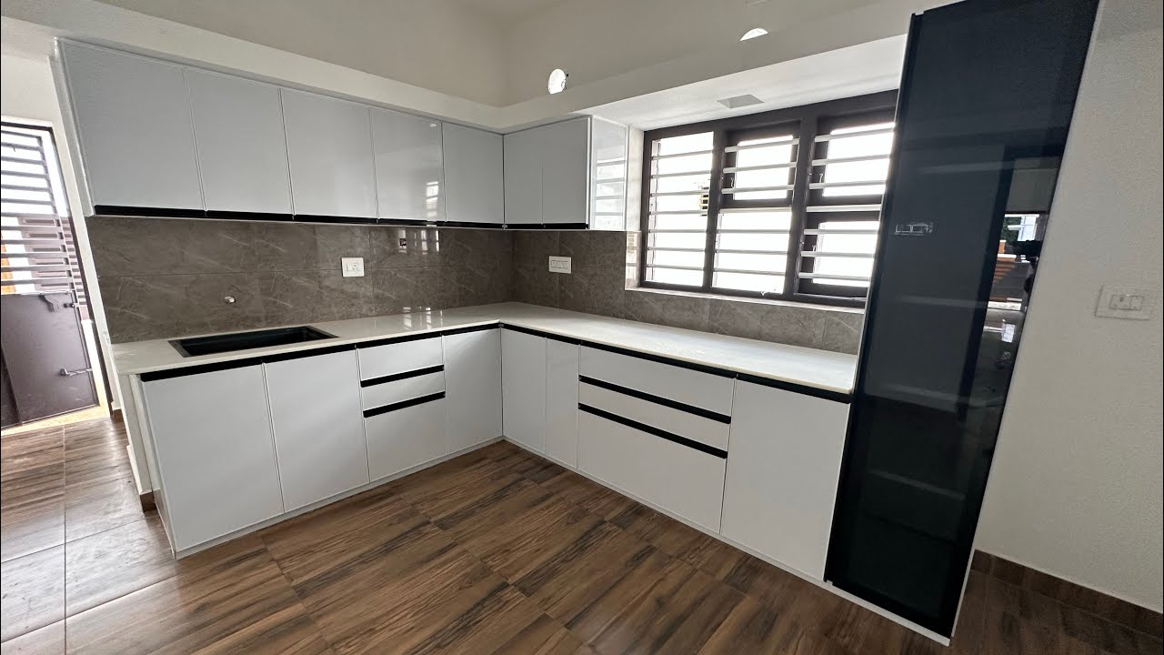 Working video of modeler kitchen made of white aluminum in Palakkad district 