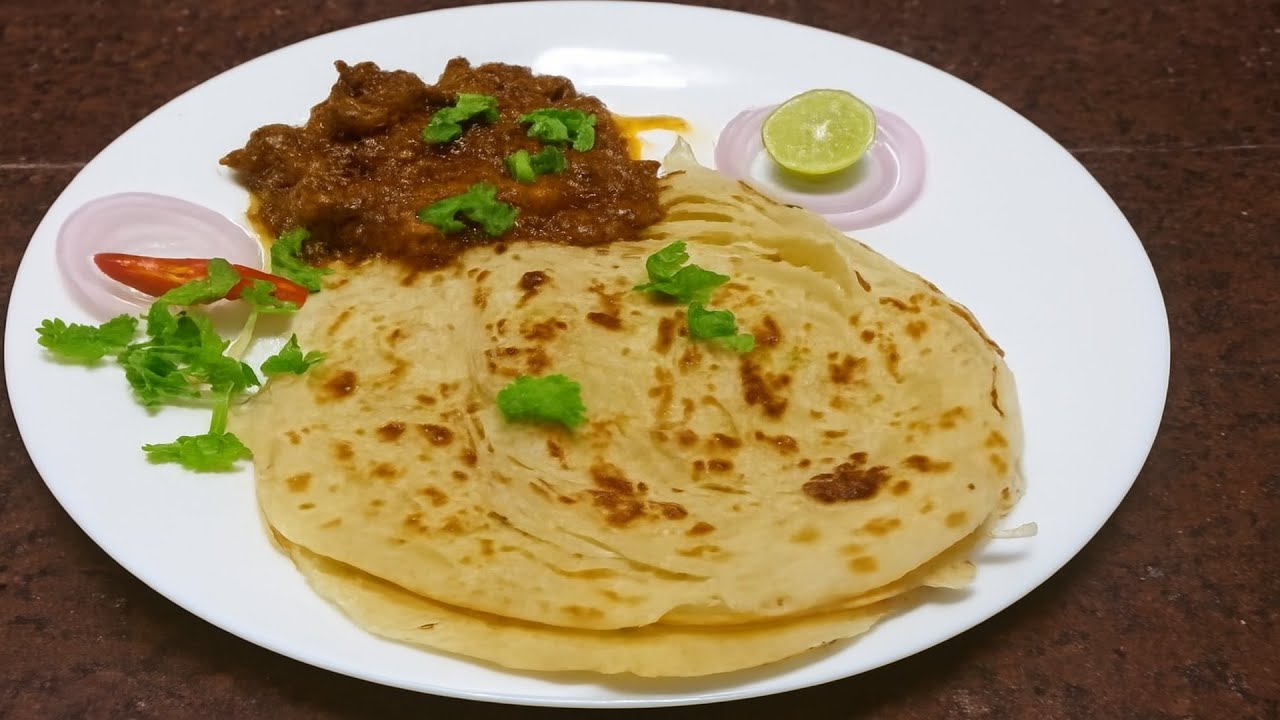 വീശിയടിച്ച നല്ല കിടിലൻ മലബാർ പെറോട്ട | Parotta -  Beef Roast Perfection.