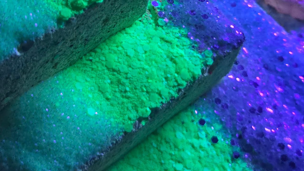 A dusty cake with rainbow of glitters