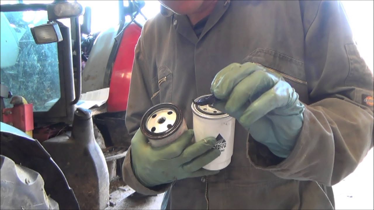 changing a fuel filter on a McCormick CX95 tractor Part 1