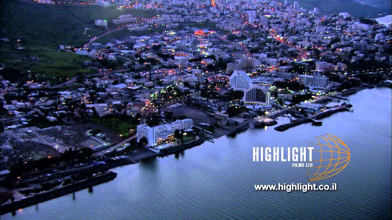 AN 044 Israel aerial footage: aerial video of the City of Tiberias and sea of Galilee at sunset