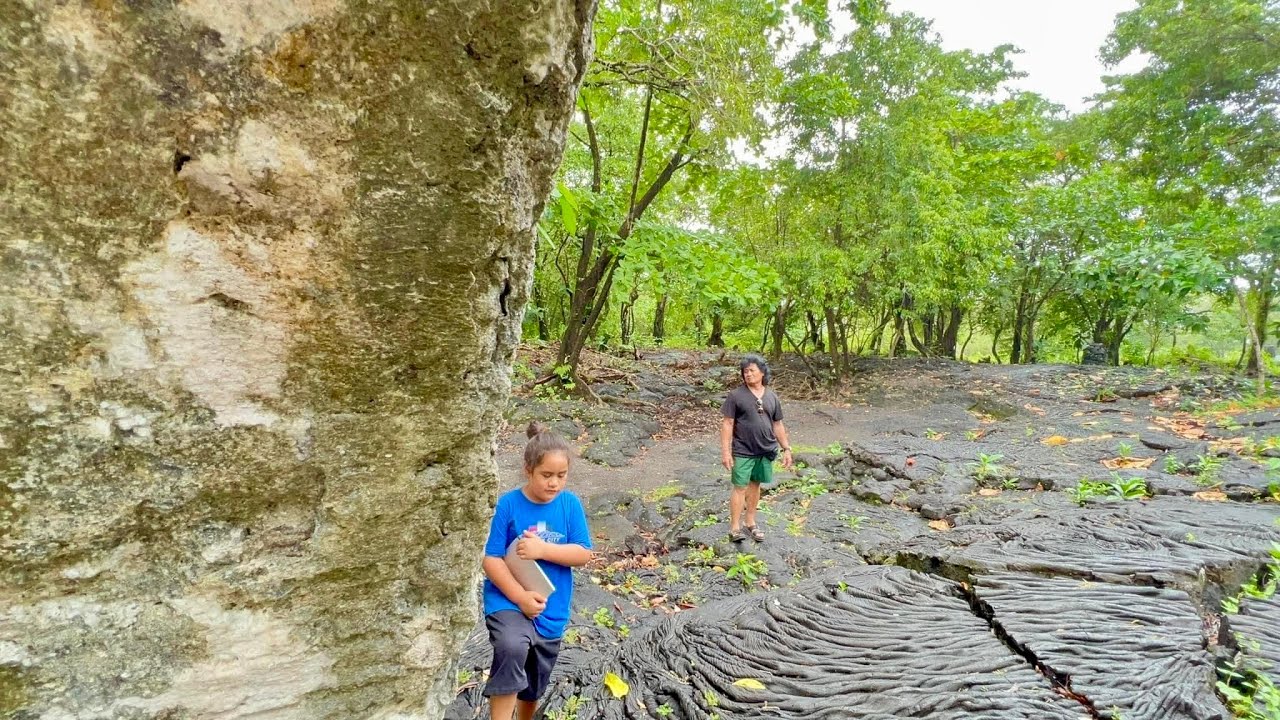 Watching  the lava field and virgin grave at Saleaula Savaii.