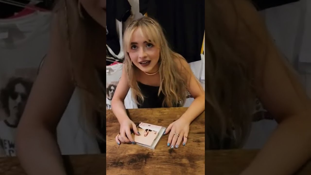 Sabrina Carpenter with fans during her album signing in New York #1 (July 19, 2022)