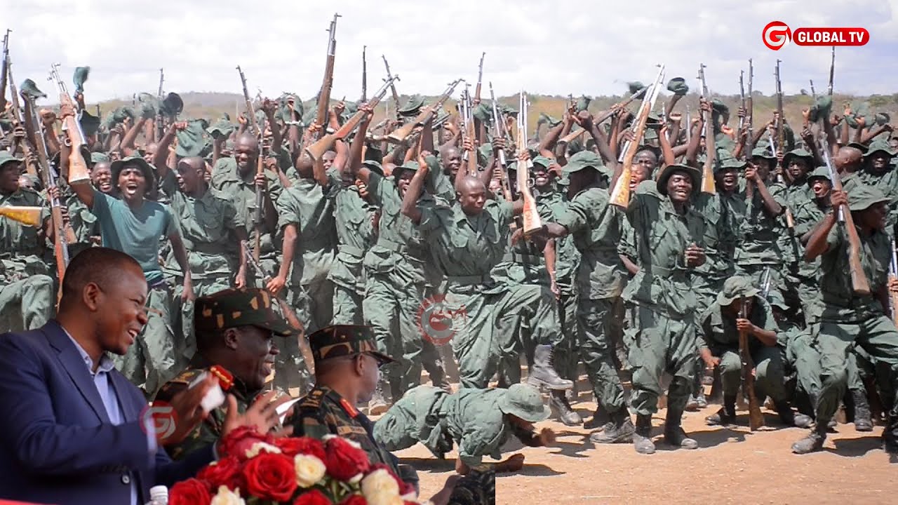 TAZAMA SHANGWE LA VIJANA WA JKT 833KJ OLJORO ARUSHA WAKIHITIMU MAFUNZO - WAIMBA PAMOJA NA DC MKALIPA
