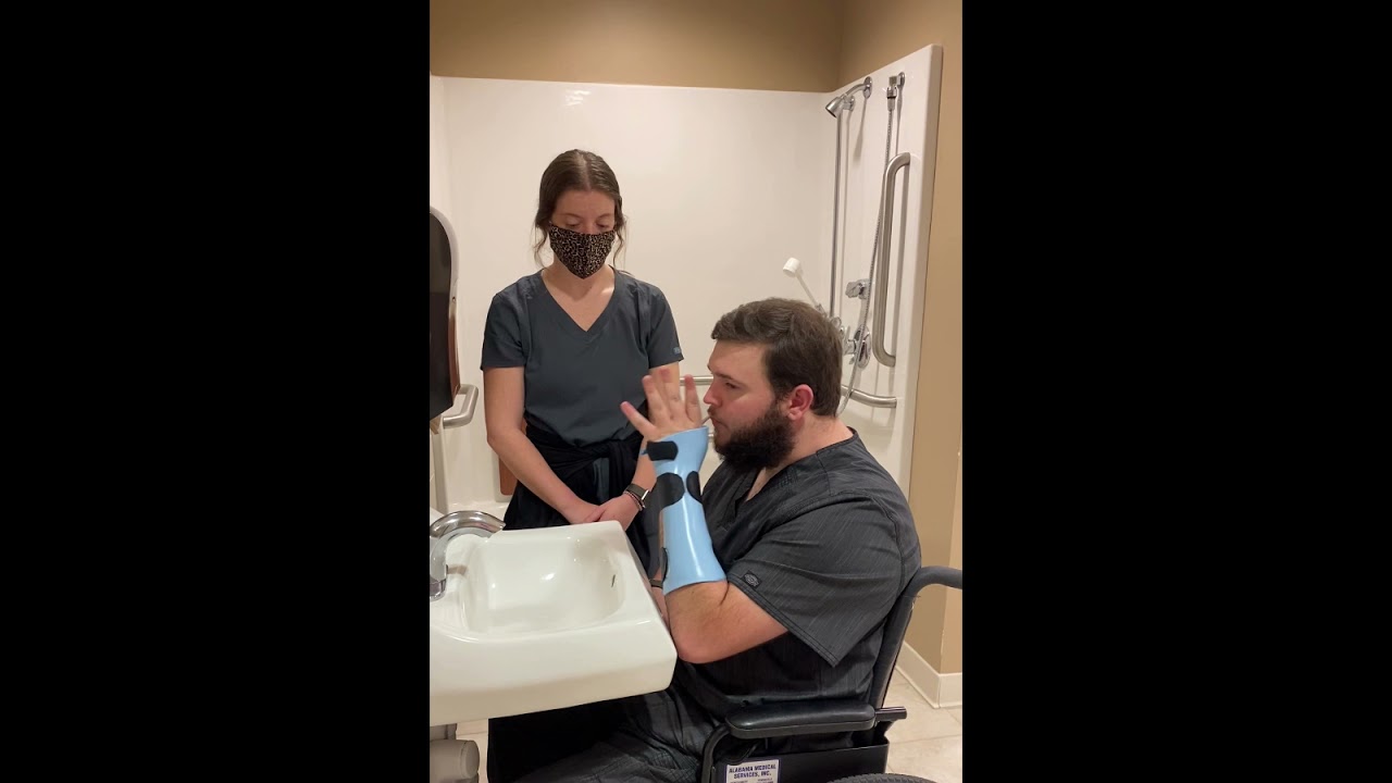 Demonstration of brushing teeth with a Universal Cuff
