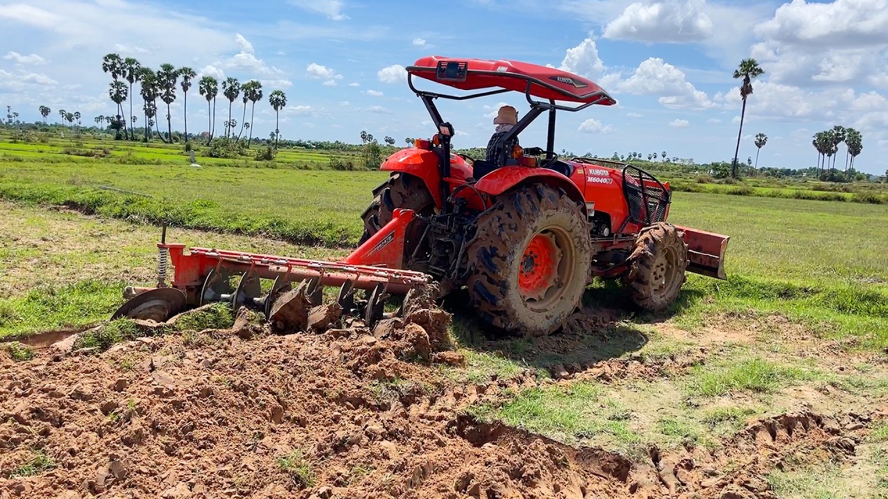 Tractor Kubota M6040 SU Plow Field Sand,Tractor Khmer Farmer