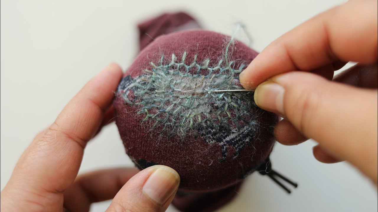 Blanket stitch visible mending