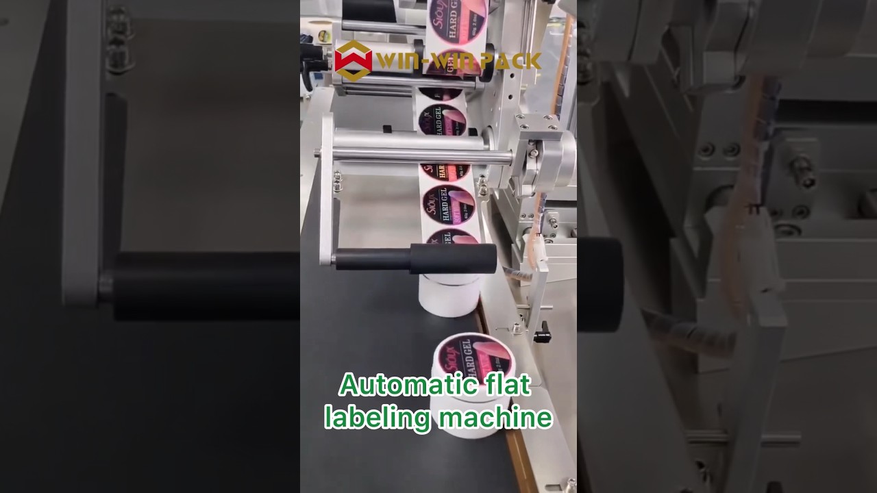 Automatic flat labeling machine/round label application #labelapplicator #labelingmachine #shorts