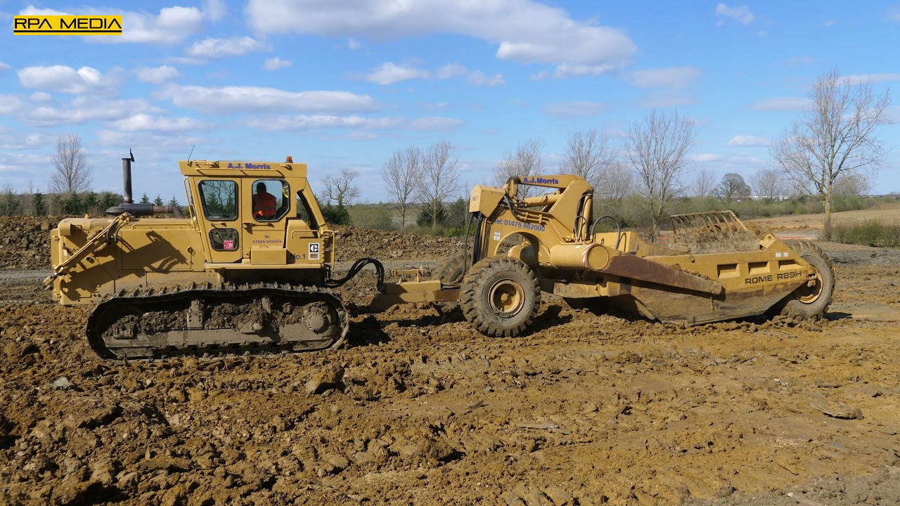 Caterpillar D8 and Rome towed scraper boxes