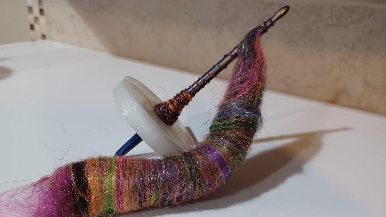 Working with a Bottom Whorl Drop Spindle for Making Yarn