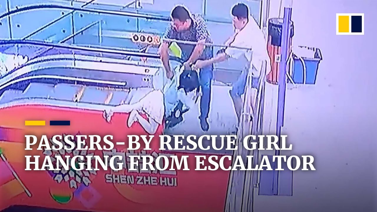 Passers-by rescue girl hanging from escalator in China