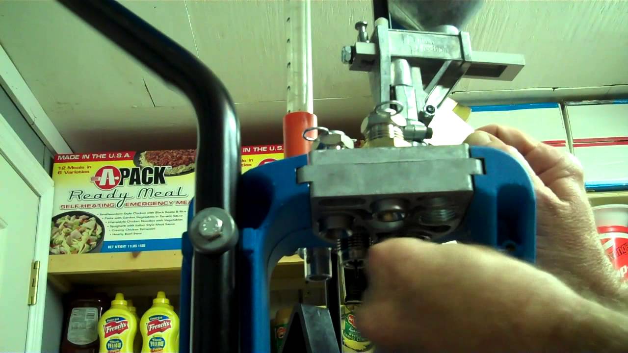 DILLON XL 650 CALIBER CHANGE PT 3 ADJUSTING THE POWDER MEASURER AND LOADING 357 MAGNUM.