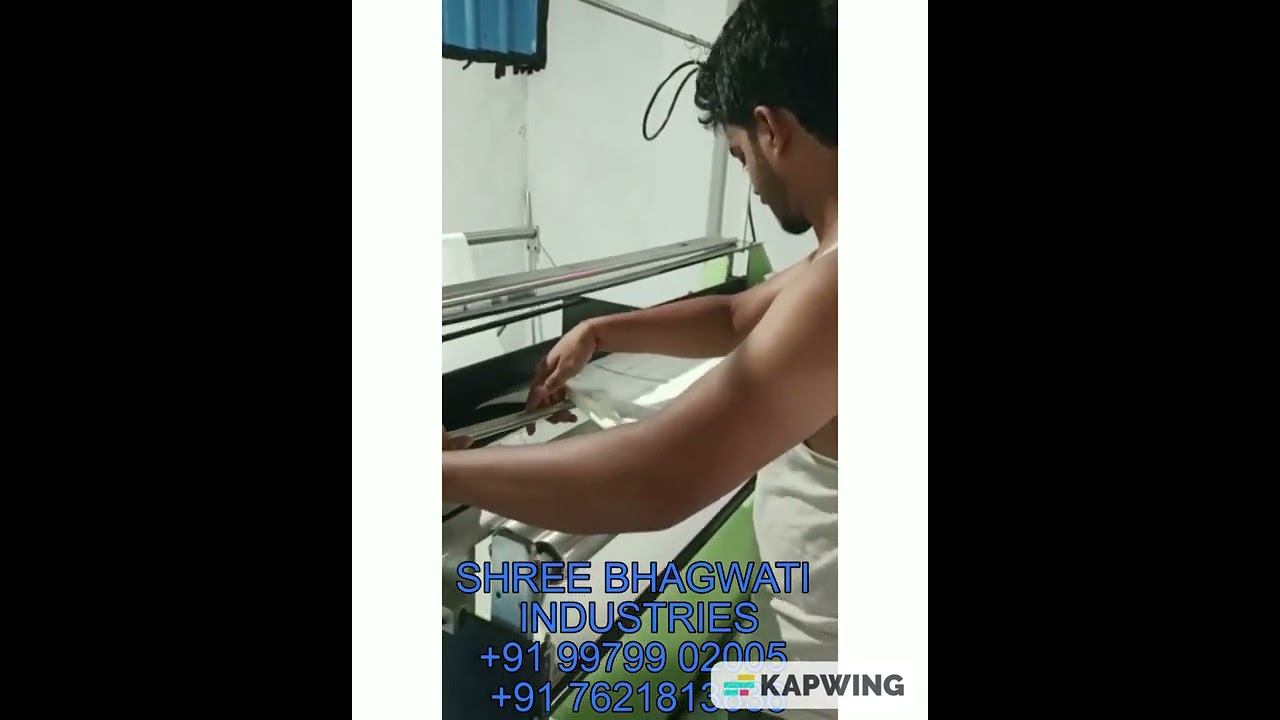 SURGICAL GAUZE BANDAGE MAKING MACHINE