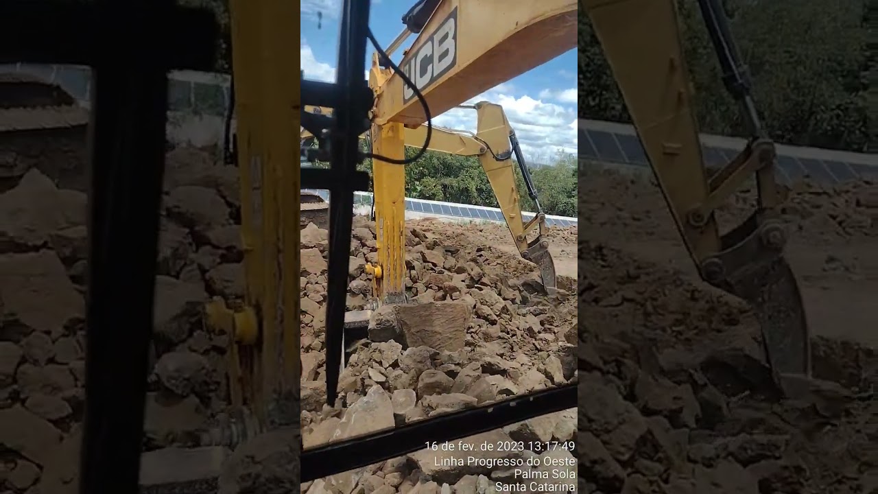 js210 e cat320D na lida com rocha amarela