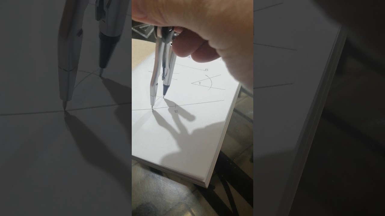 Construcción de un triángulo dado un lado y dos ángulos
