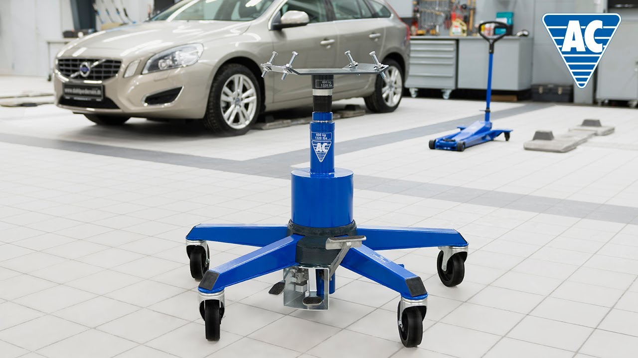 Transmission jack with pneumatically controlled high speed