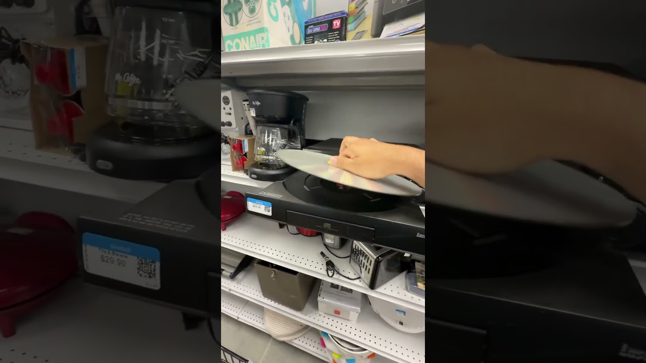 A laser disc player! Look at the size of the disc! 💿🎶 #laserdisc #electronics