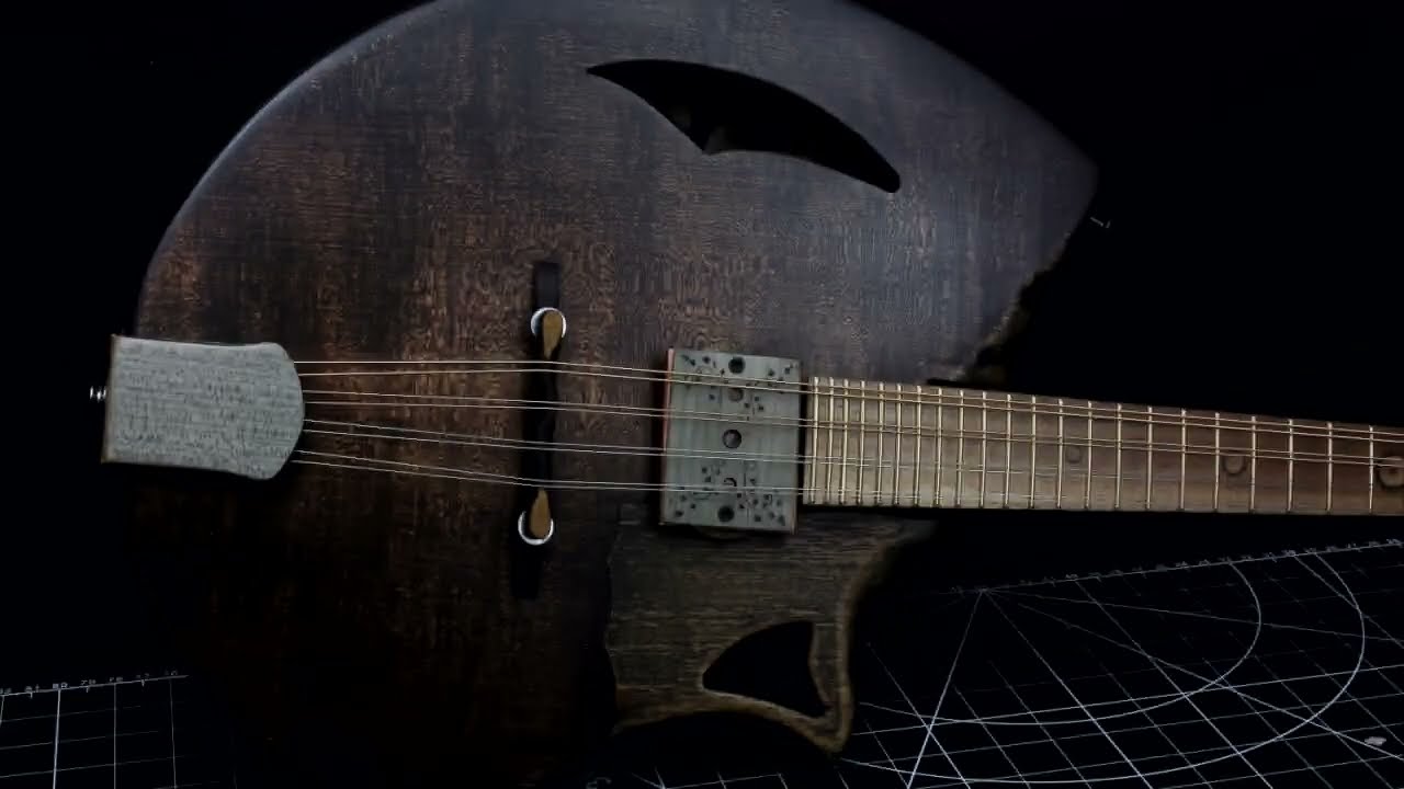 Handmade shell back mandolin created by Ray Vincent. Plugged in sound sample. Single coil pickup.