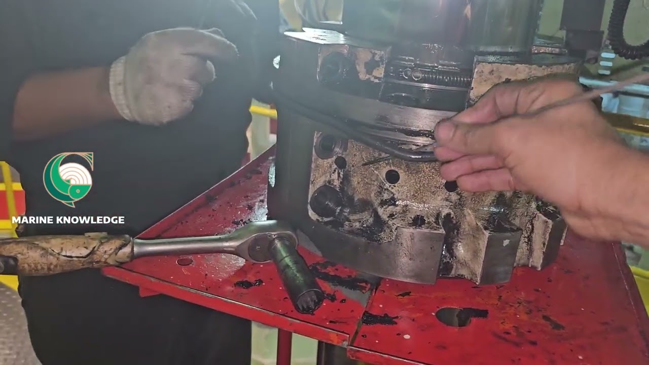 HOW DO THEY DO...How to dismantle piston stuffing box for main engine  MAN B&W 8S50MC-C...