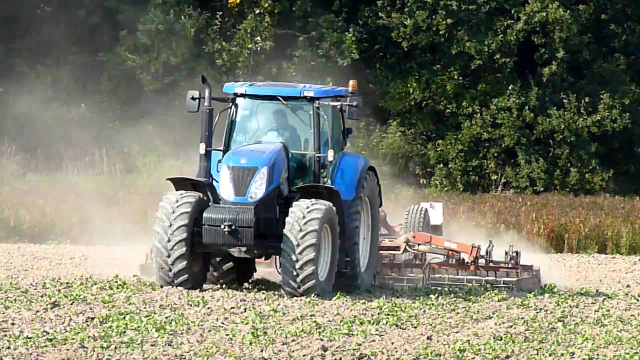 New Holland T7050 + Ostroj Saturn