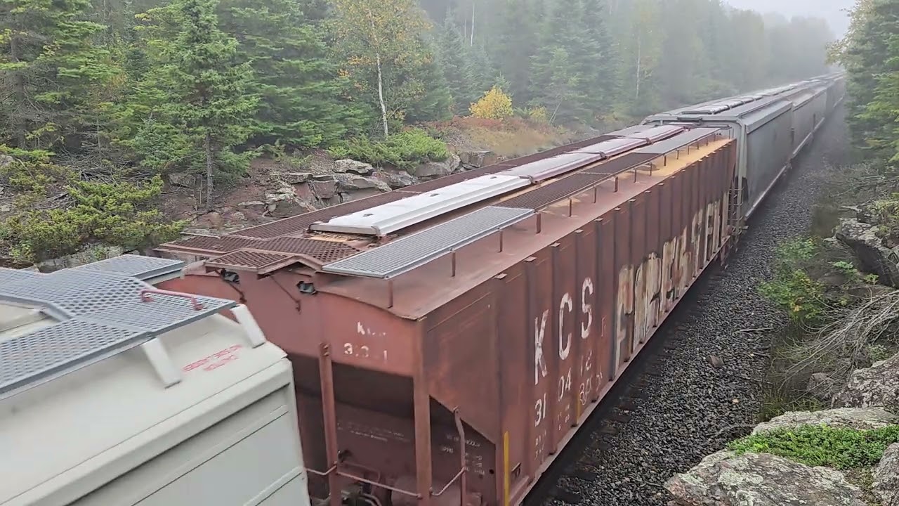 Eastbound CPKC grain train luggs up the grade into Ingolf on a foggy morning. 9/13/25.