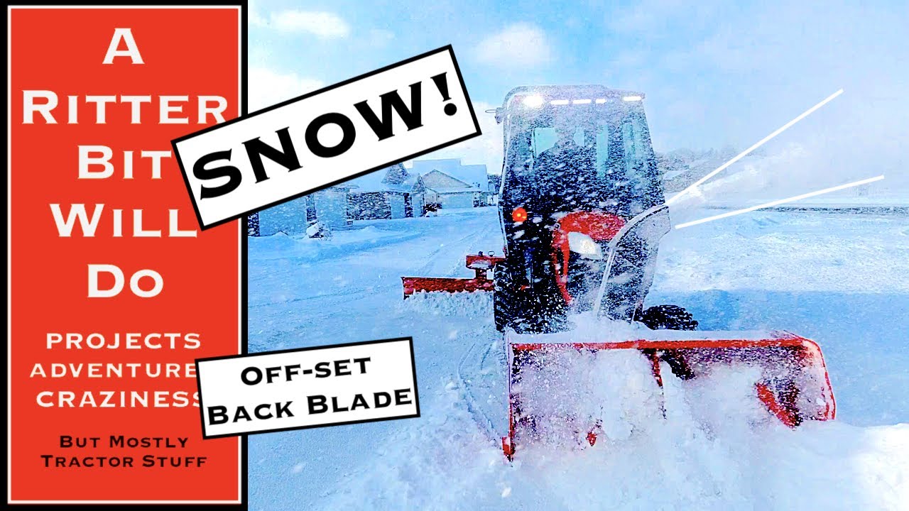 KUBOTA BX TRACTOR CLEARS SNOW (Curtis cab, snowblower and backblade)