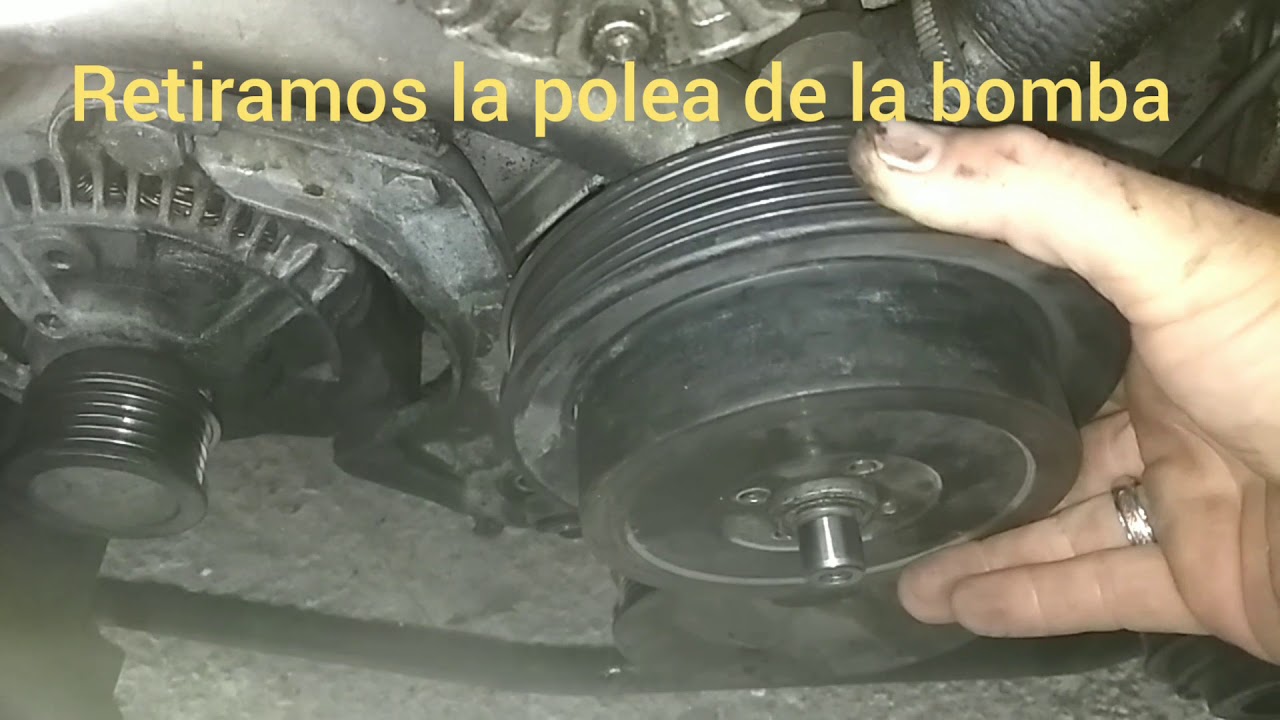 Cambio bomba agua Mercedes w201 w124 ... En español