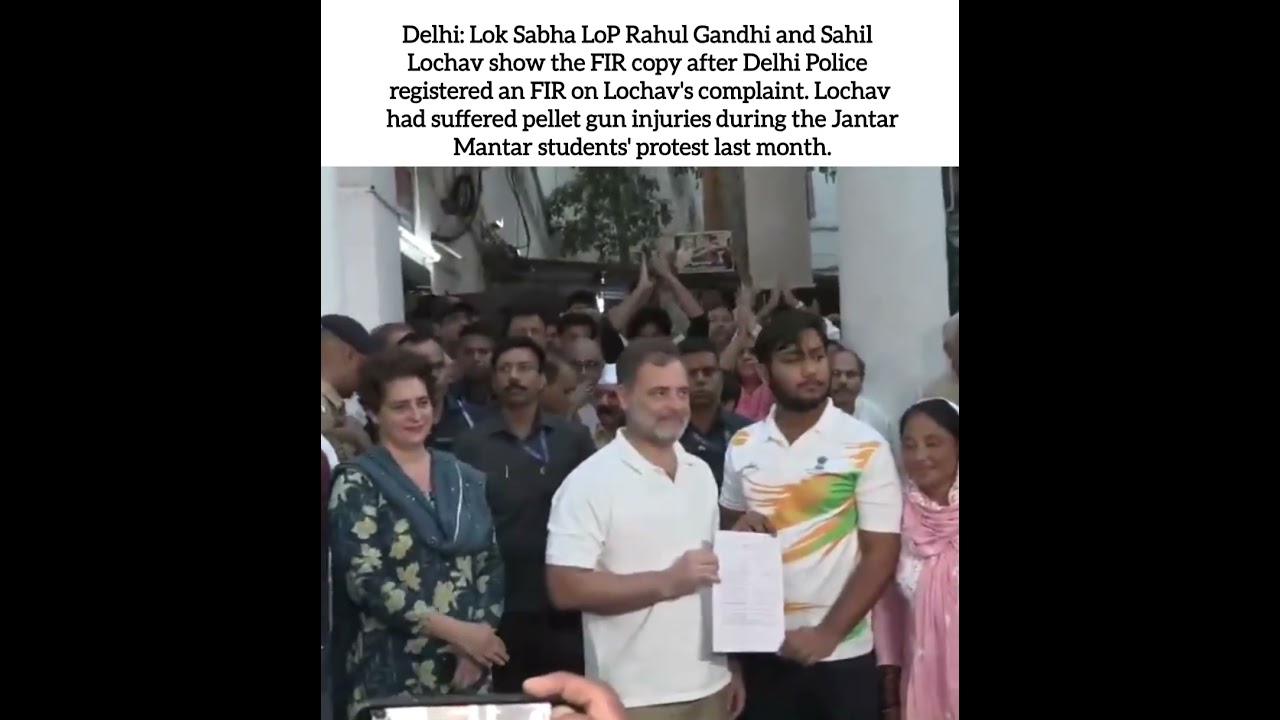 Rahul Gandhi and Sahil show the FIR copy after Delhi Police registered an FIR on Lochav's complaint