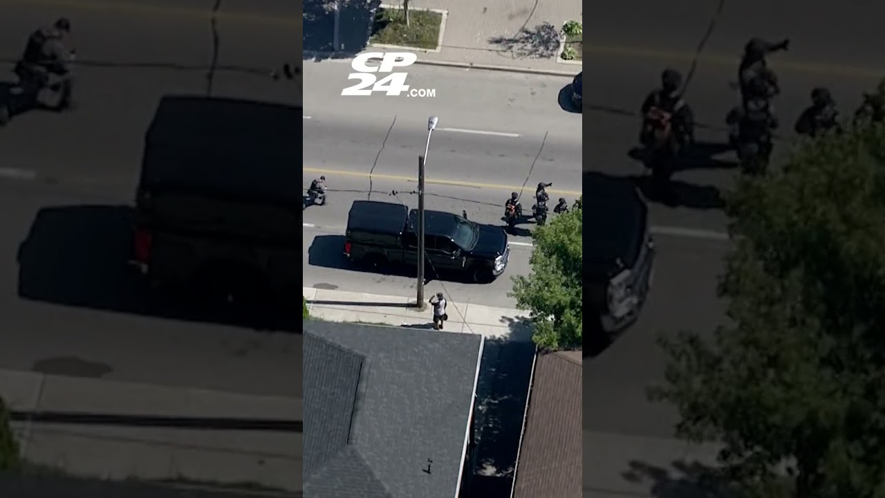 Police investigate a nearby double shooting in Toronto