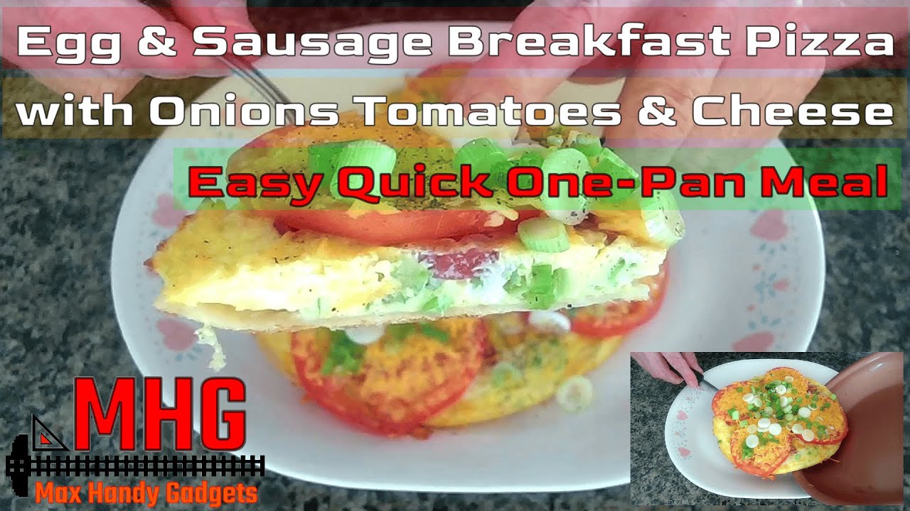 Egg and Sausage Breakfast Pizza with Onions Tomatoes and Cheese