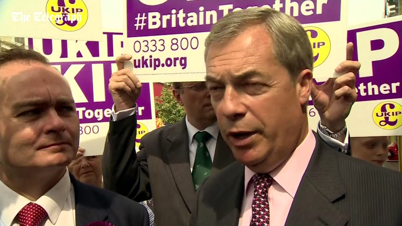 Video captures exact moment Nigel Farage finds out Craig Mackinlay has been charged