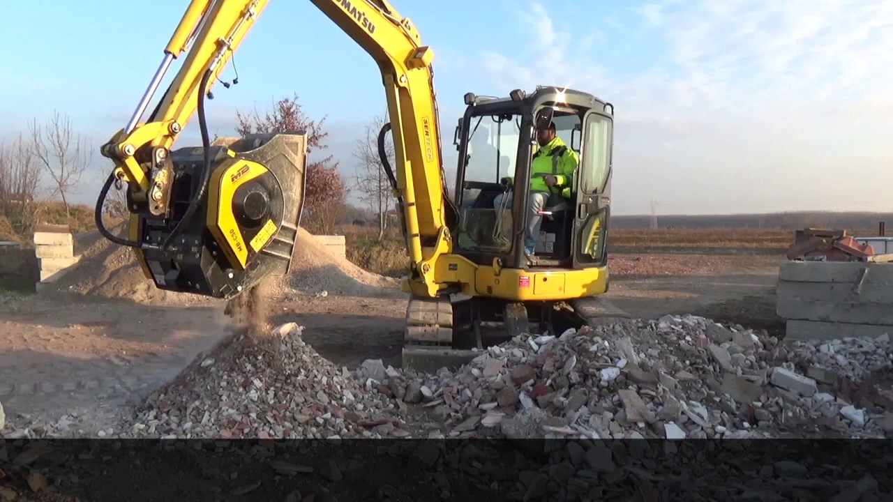 Riduzione volumetrica con benna frantoio MB Crusher MB-C50 S2