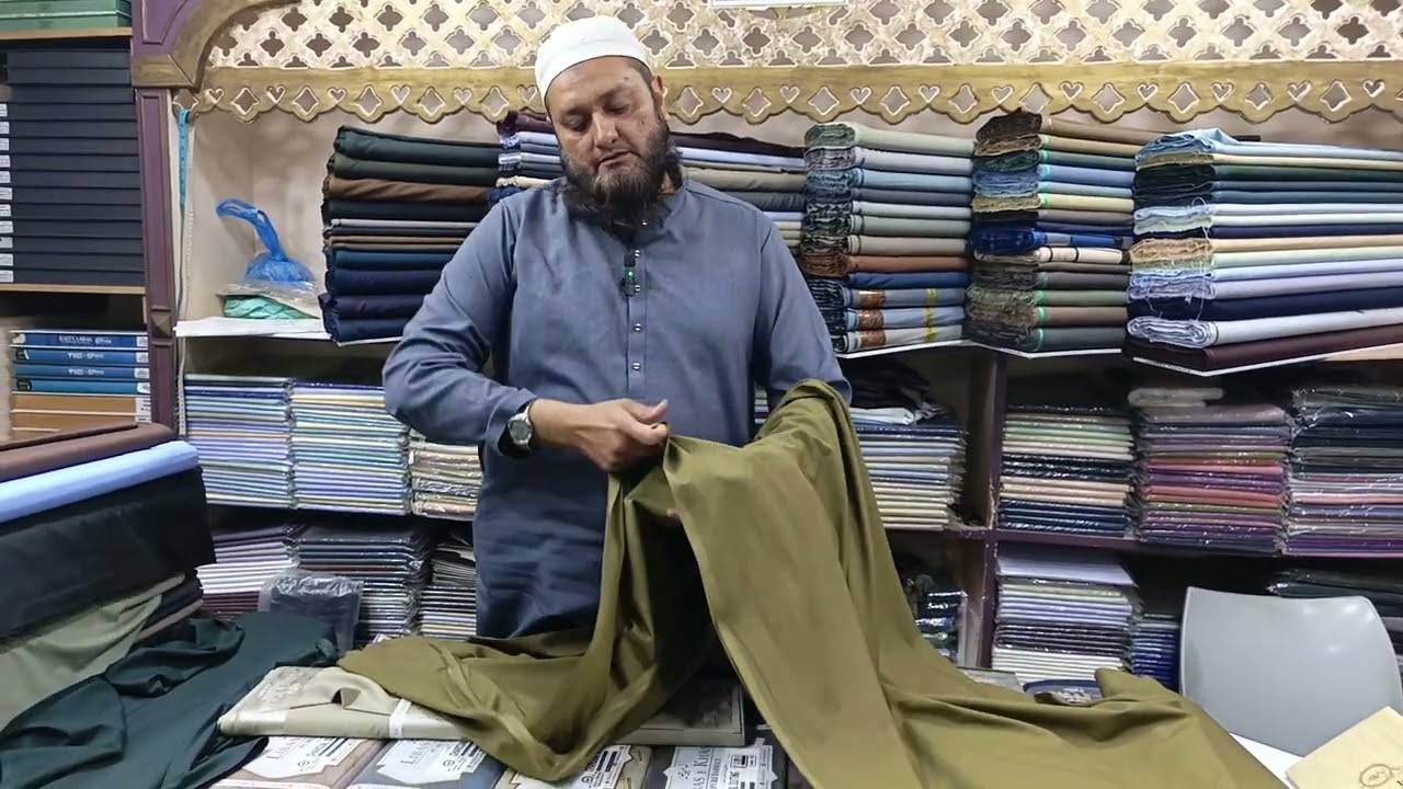 Charcoal suting by libase Khas available to Al rijal man's fabric