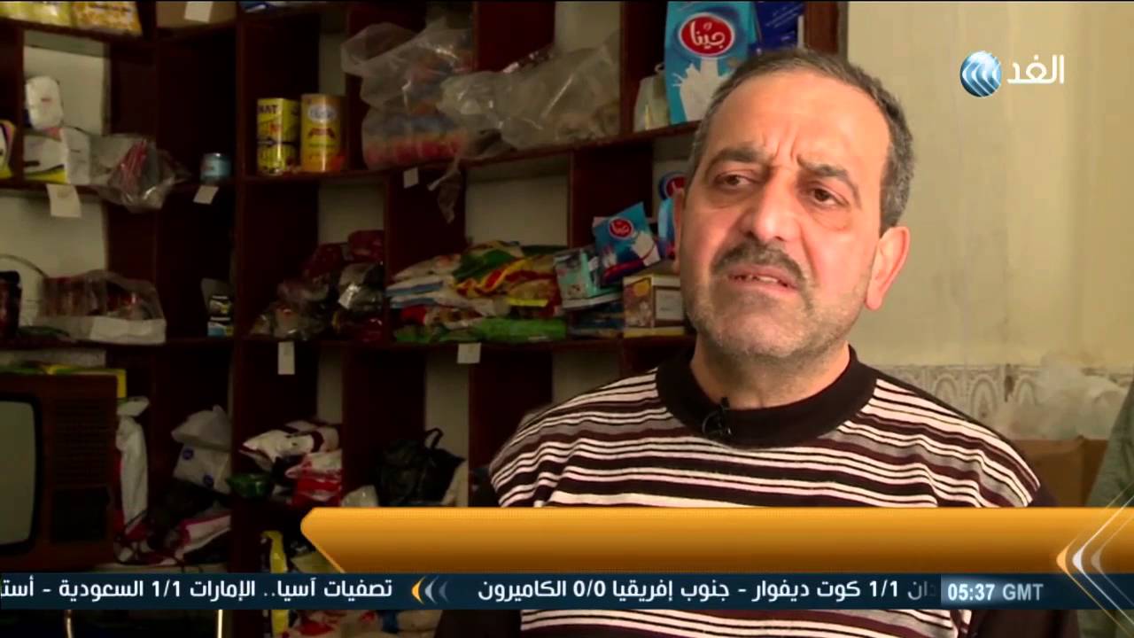 أصحاب محلات في سوق حمص بسوريا يستأنفون أعمالهم