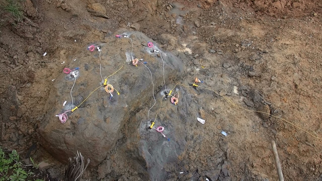 Blasting a small rock on a site cut in The Basin