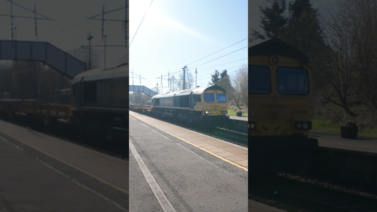 Network Rail Civil Engineering train hauled by Freightliner Class 66 passing Holytown 