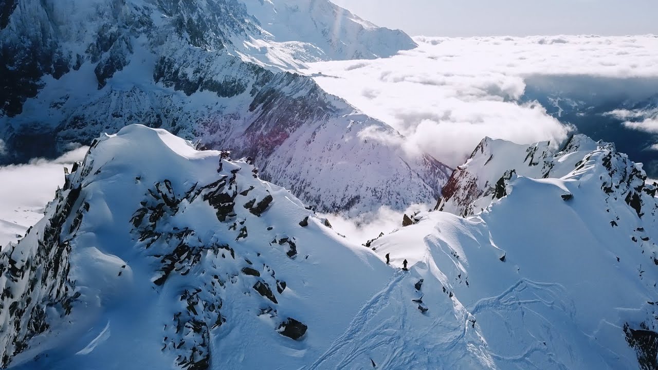 Skiing high above the clouds in Chamonix France | Les Grands Montets by drone 4K