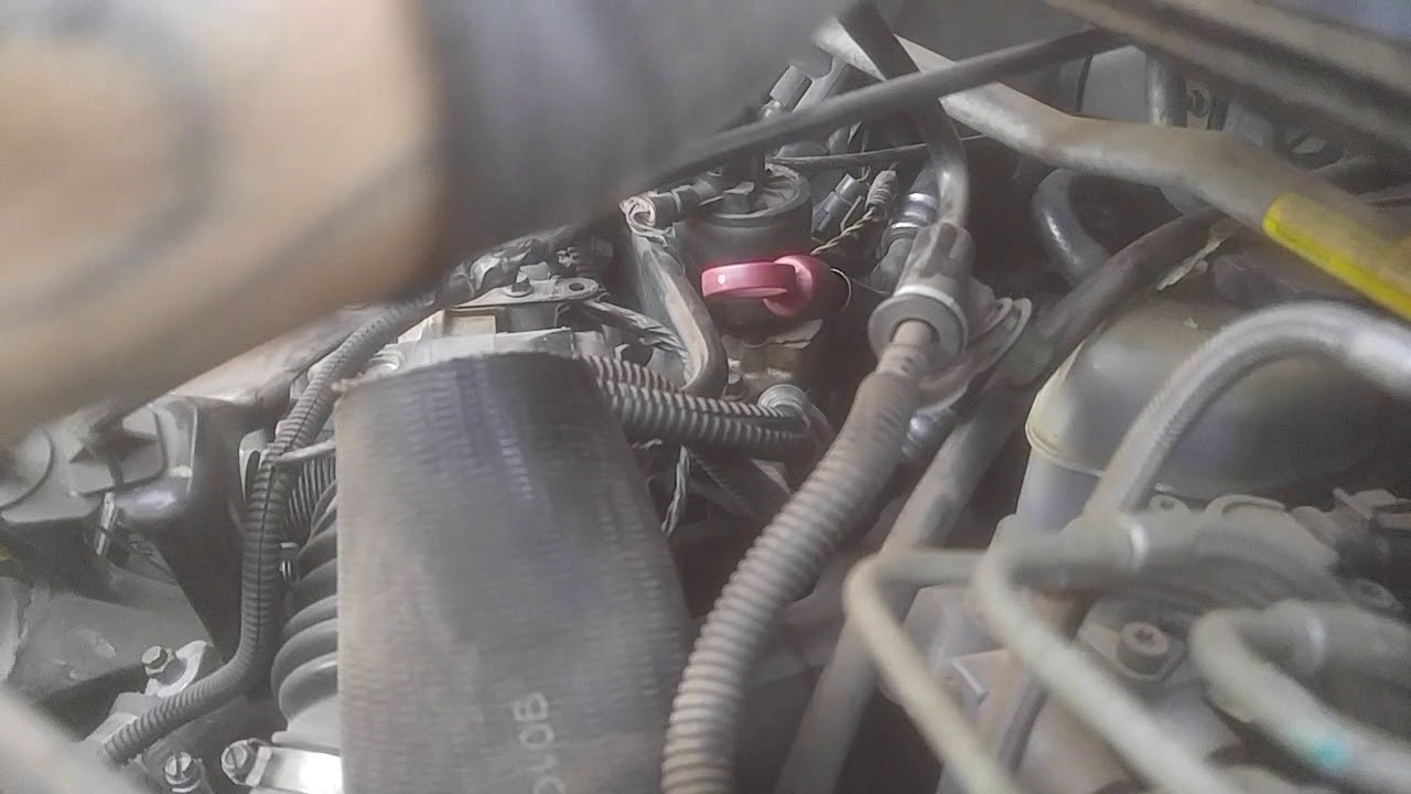 Como cambiarle las bujias i cables  a una van oldsmobile oh chevrolet venture