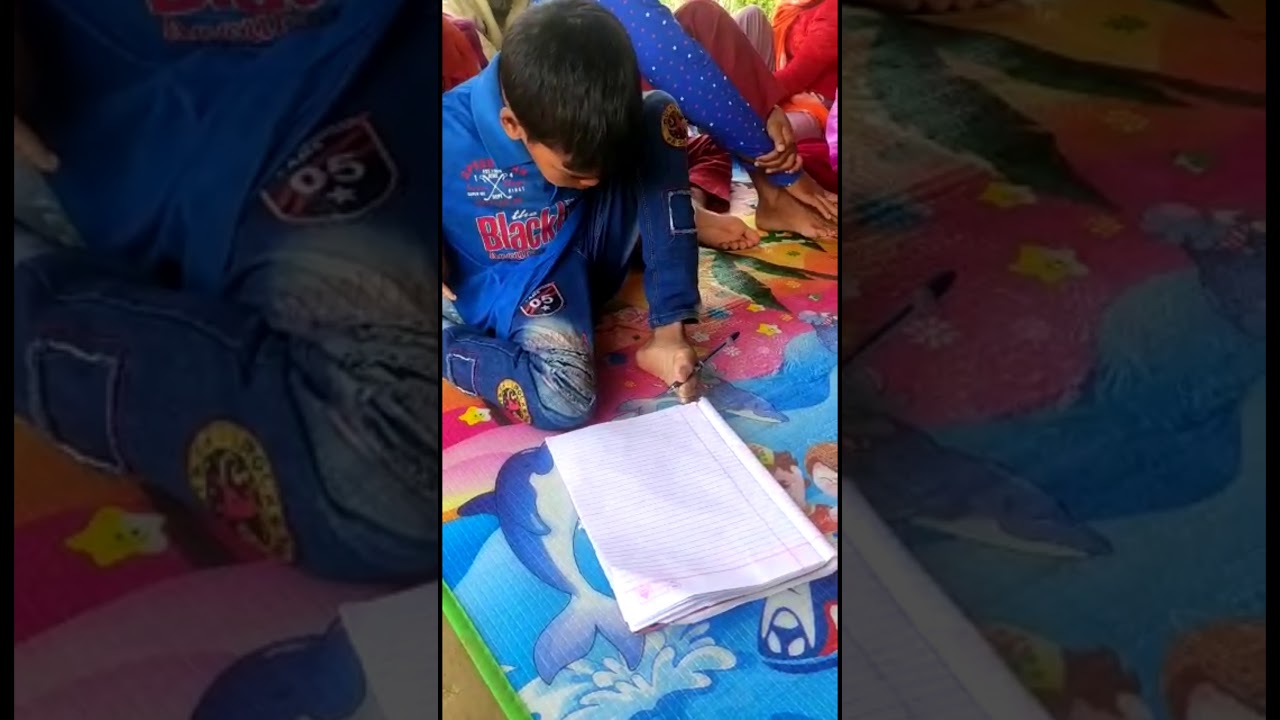 Writing with feet by Afsar 14 years Cerebral Palsy | PWD talent show