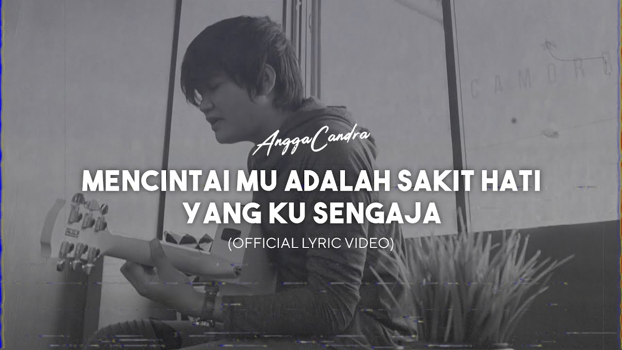 Angga Candra - Mencintaimu Adalah Sakit Hati yang Ku Sengaja (Official Lyric Video)
