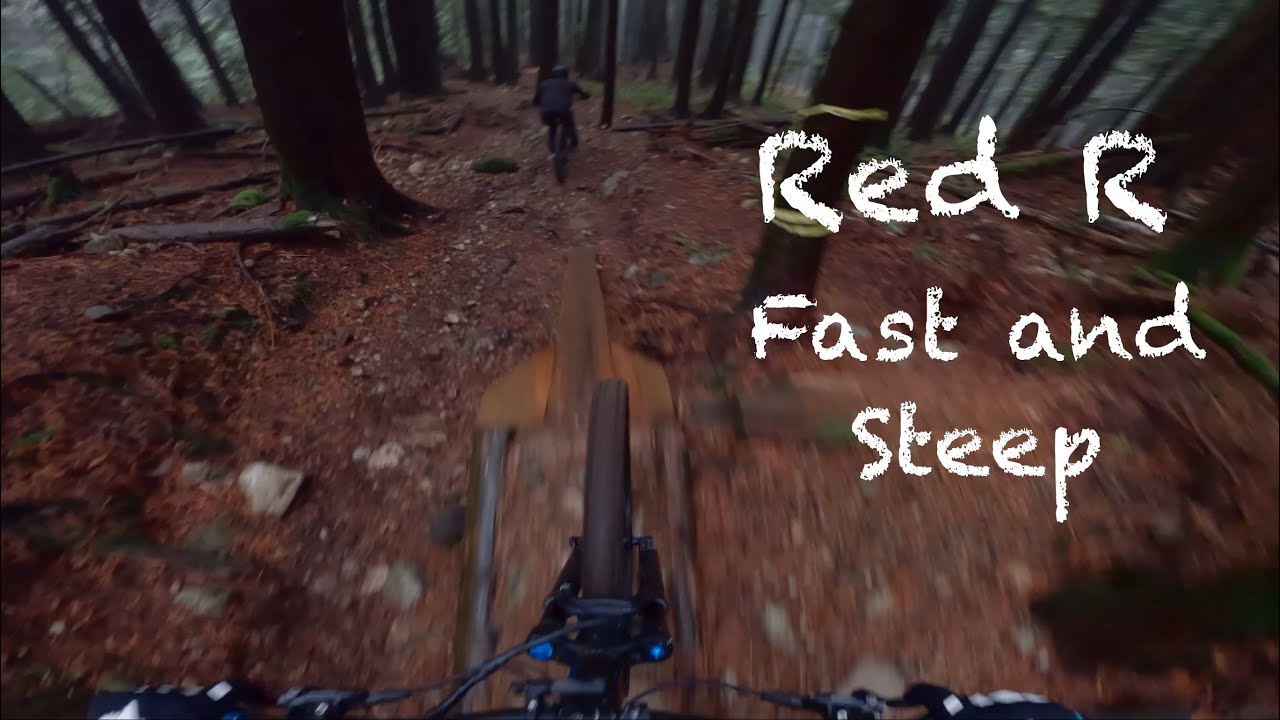 Wet Slippery Conditions on a Steep Mountain Bike Trail 