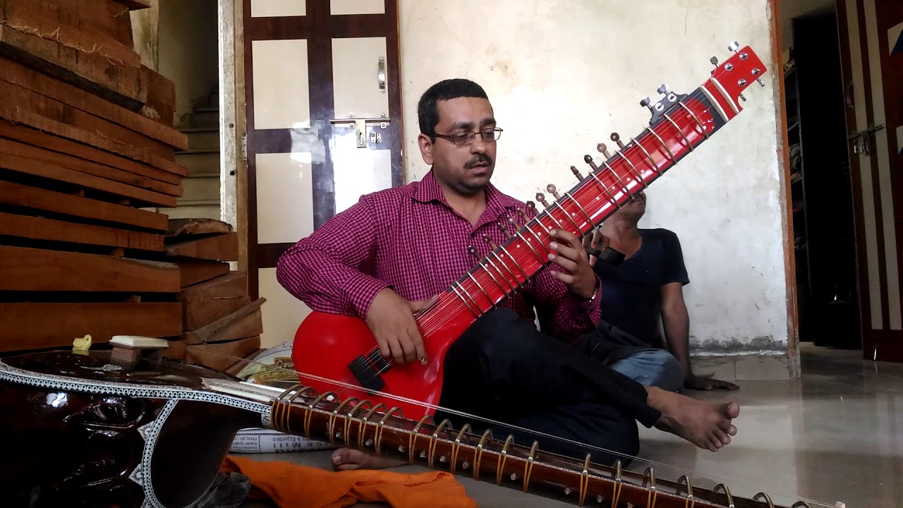 Jigar mistry checking our new travel sitar /zitar ....